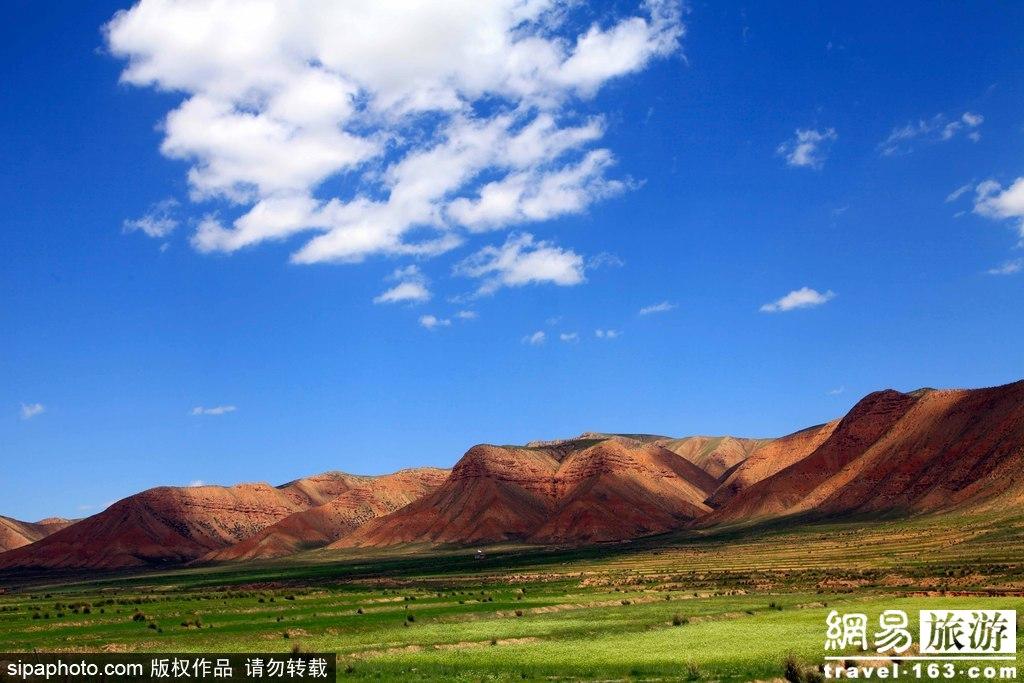 张掖丹霞：奇险灵秀美如画 彩虹卧波在山巅 第1页